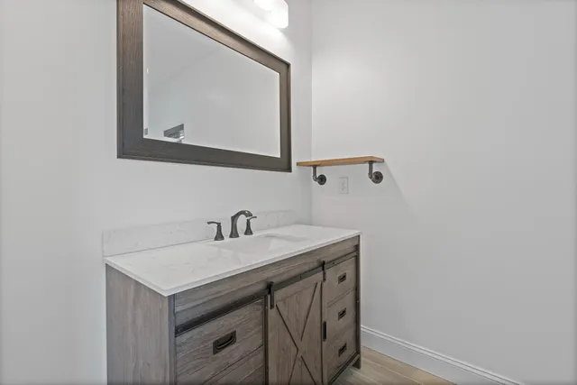 a bathroom with a bathtub and a toilet