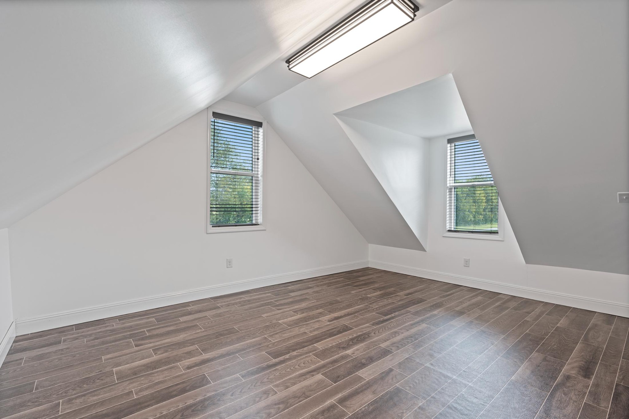 28 Henderson Road Lynchburg, TN 37352 - Photo 27 of 50 an empty room with wooden floor and windows
