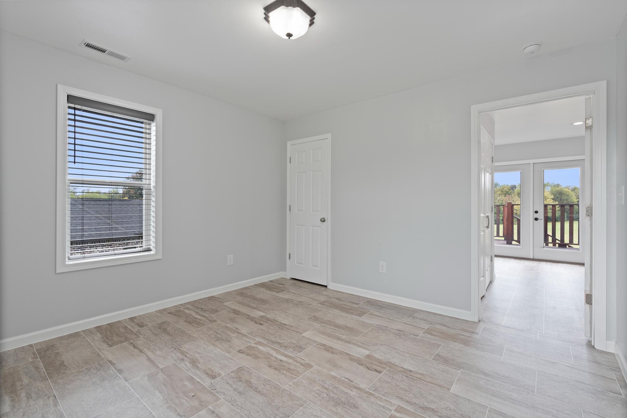 28 Henderson Road Lynchburg, TN 37352 - Photo 36 of 50 a view of an empty room with wooden floor and a window