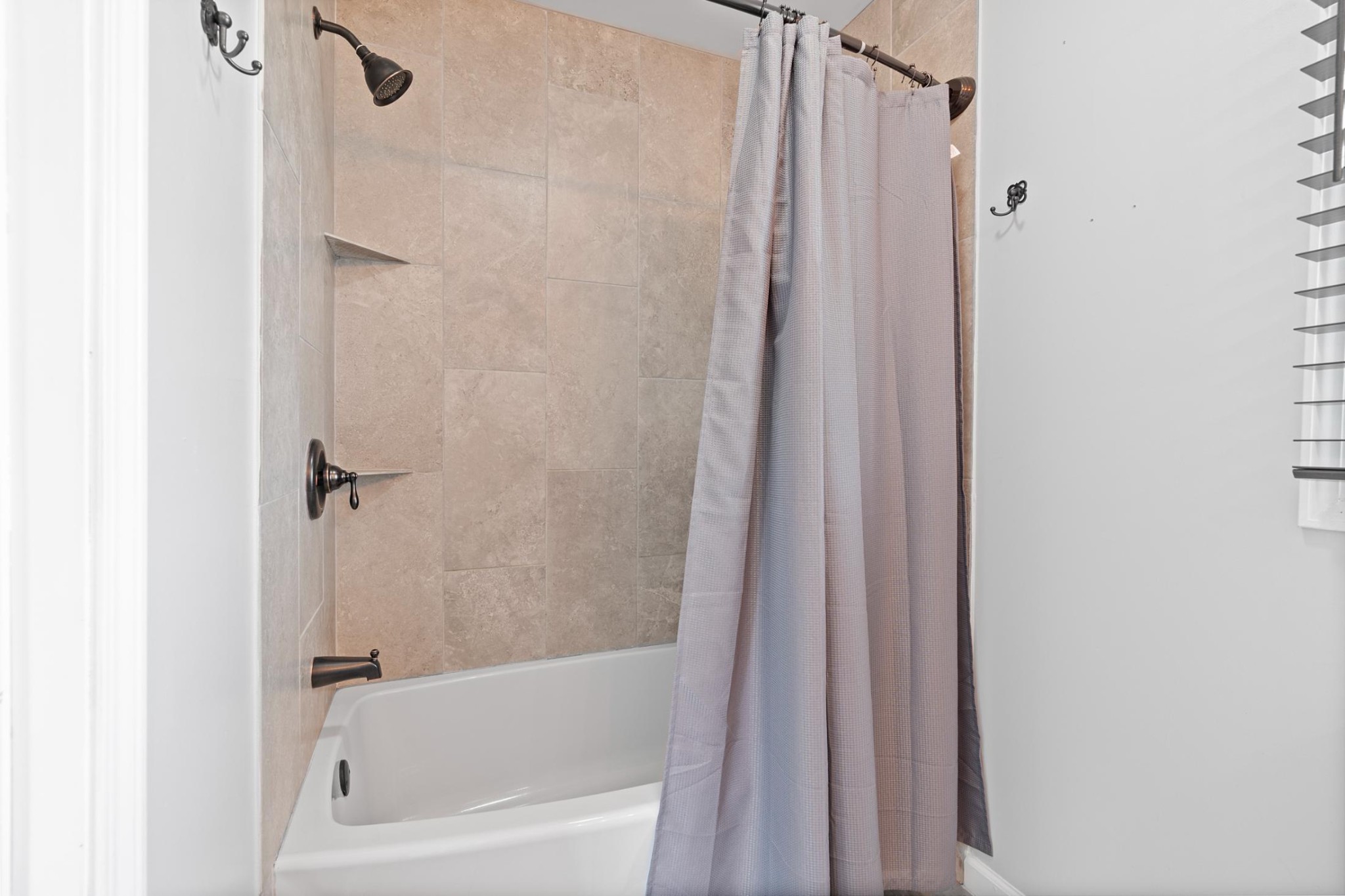 28 Henderson Road Lynchburg, TN 37352 - Photo 38 of 50 a bathroom with a shower and a bath tub