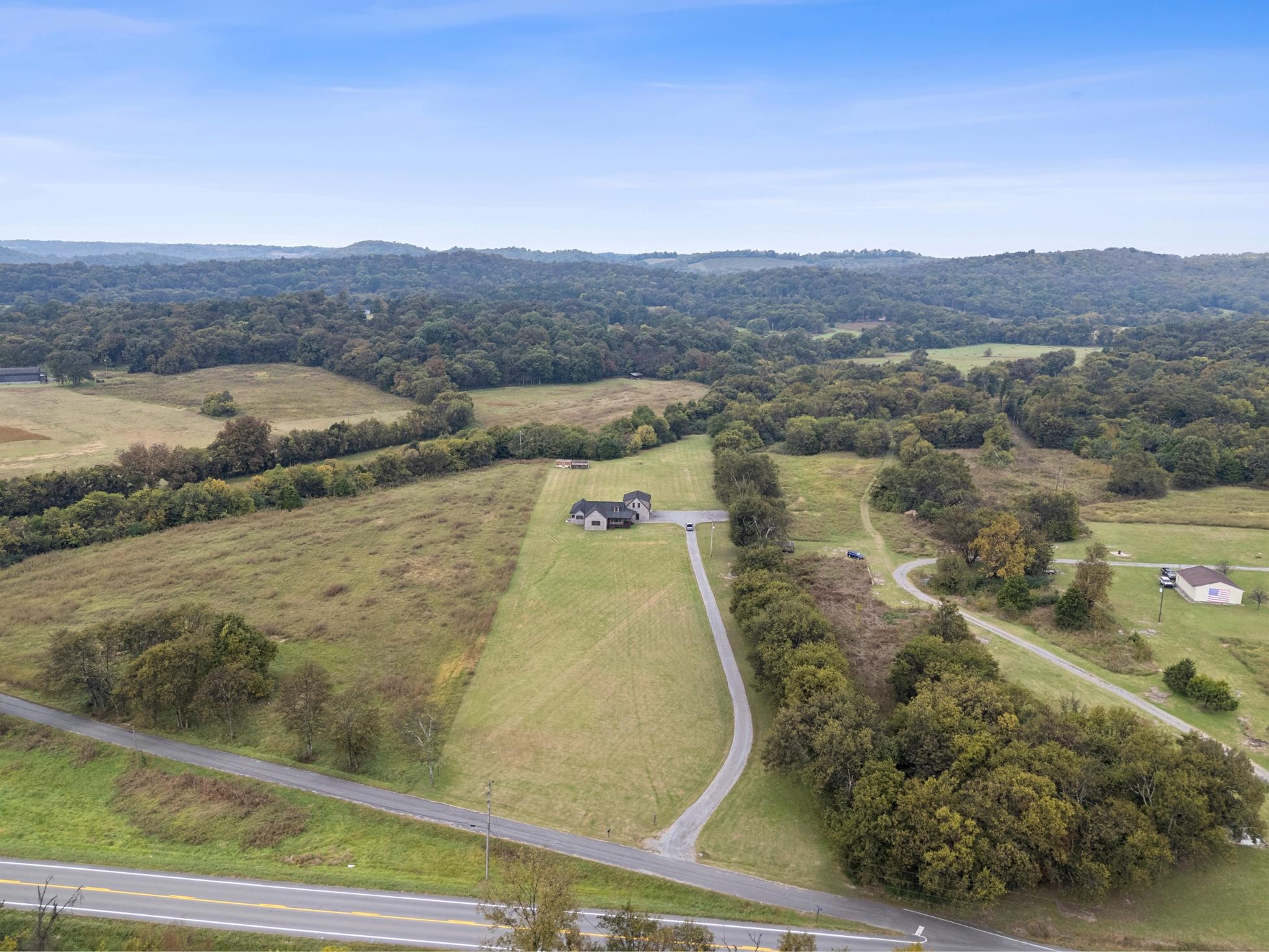 28 Henderson Road Lynchburg, TN 37352 - Photo 46 of 50 an aerial view of residential houses with outdoor space and mountain view