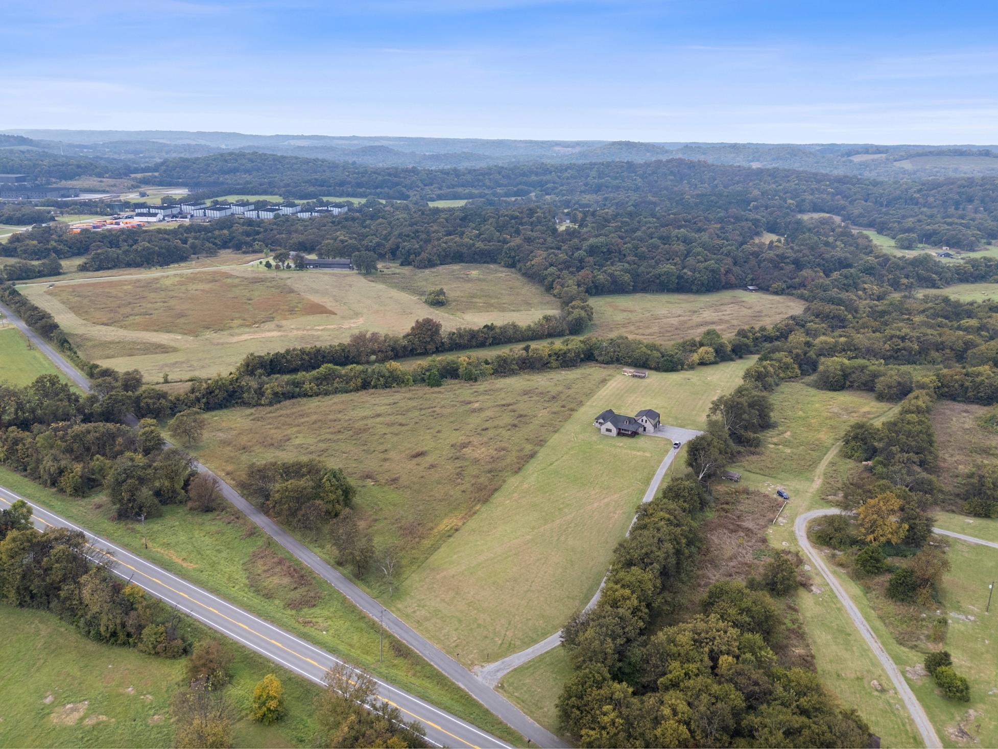28 Henderson Road Lynchburg, TN 37352 - Photo 47 of 50 an aerial view of residential houses with outdoor space