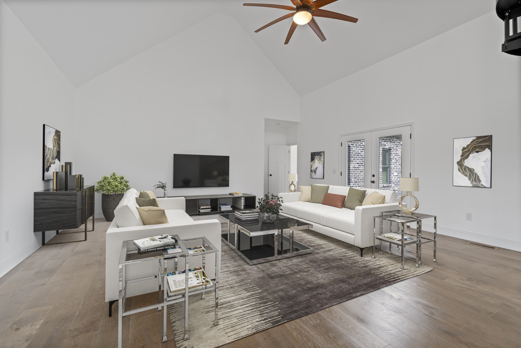 28 Henderson Road Lynchburg, TN 37352 - Photo 7 of 50 a living room with furniture and a flat screen tv