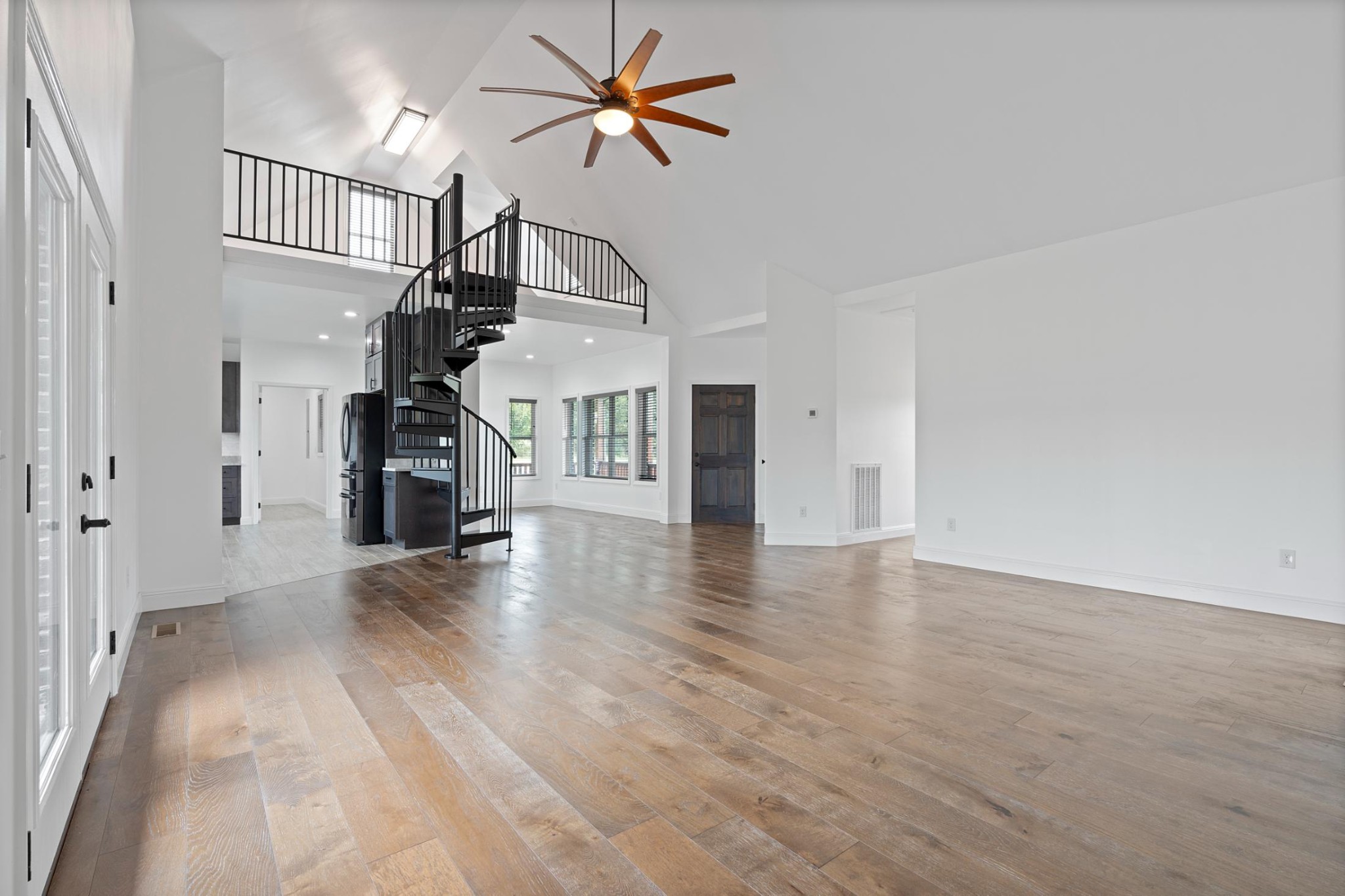 28 Henderson Road Lynchburg, TN 37352 - Photo 10 of 50 a view of empty room with wooden floor and fan