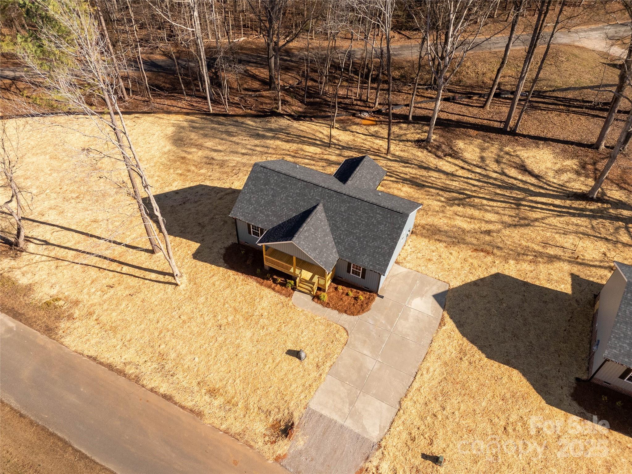 970 Helms Street Rock Hill, SC 29732 - Photo 6 of 32 a backyard of a house with table and chairs
