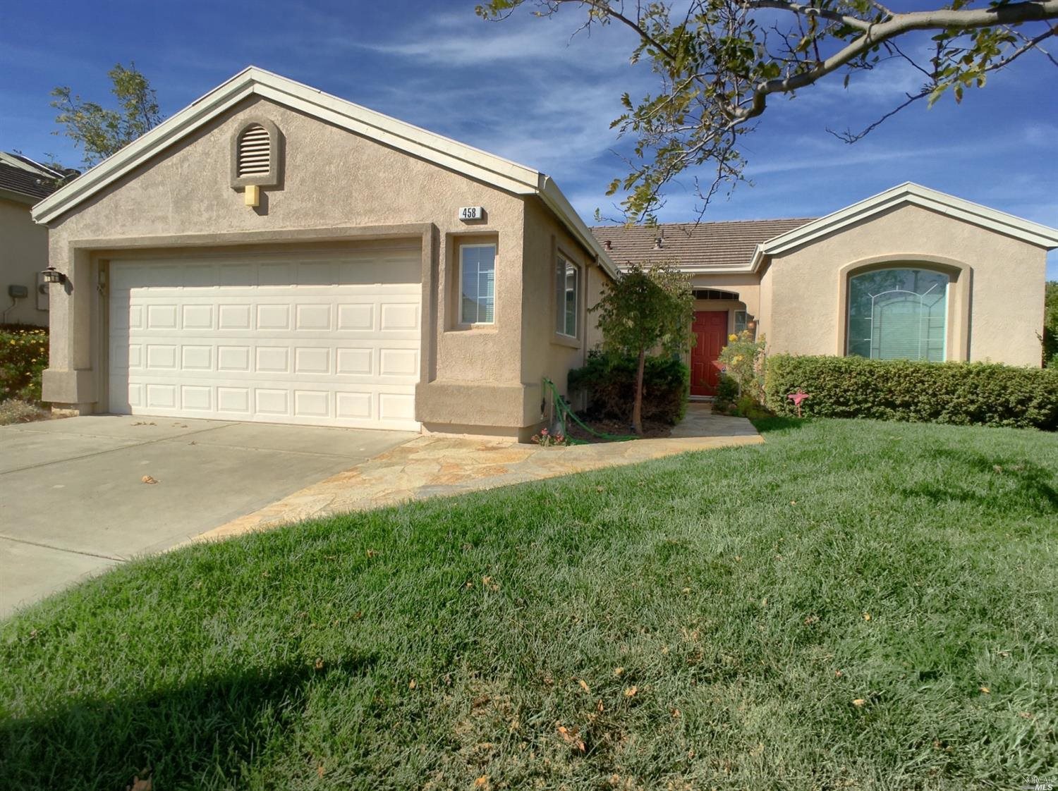 458 Cedar Ridge Drive Rio Vista, CA 94571 - Photo 1 of 1 Front of home. Home has an oversized garage with side door and windows. Flagstone walkway to front door.