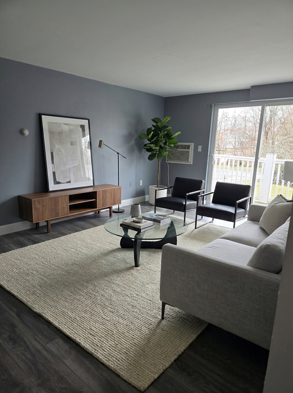 103 Hart Street, Unit 5206 Taunton, MA 02780 - Photo 3 of 9 a living room with furniture and a large window