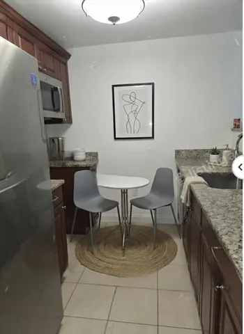 a dining room with furniture