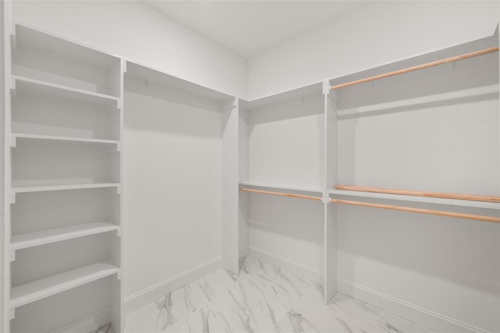 149 L B J Ranch Road Trinidad, TX 75163 - Photo 26 of 31 Walk in closet featuring marble look tile flooring