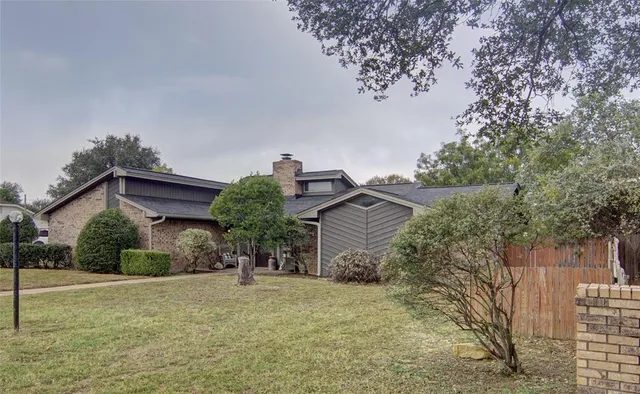 front view of a house with a street
