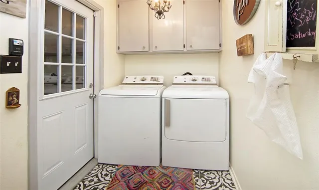 a living room with furniture a flat screen tv and a walk in closet