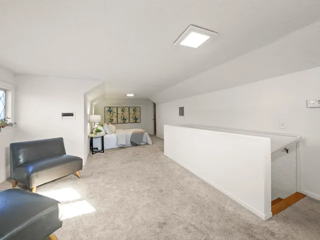 a view of livingroom with furniture and cabinet