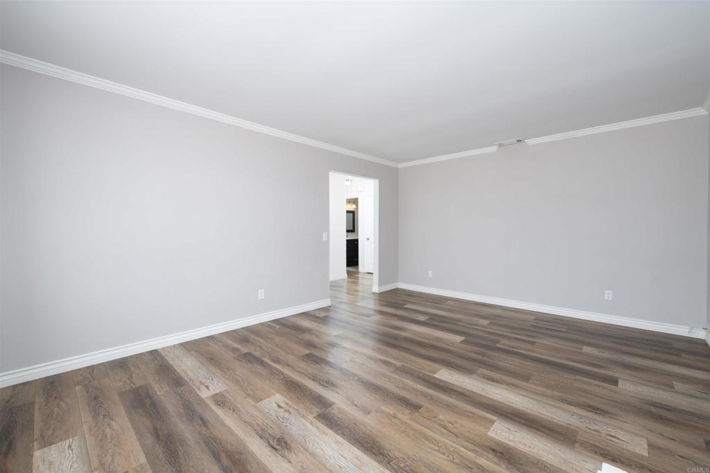 4215 Cielo Avenue Oceanside, CA 92056 - Photo 14 of 27 a view of empty room with wooden floor