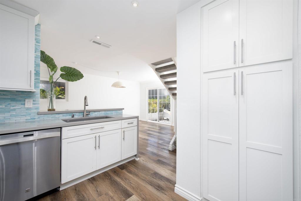 4215 Cielo Avenue Oceanside, CA 92056 - Photo 16 of 27 a bathroom with a double vanity sink and mirror
