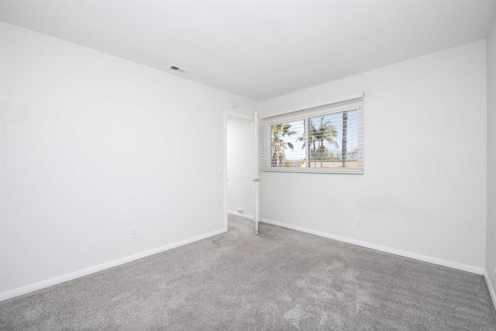 4215 Cielo Avenue Oceanside, CA 92056 - Photo 24 of 27 an empty room with windows