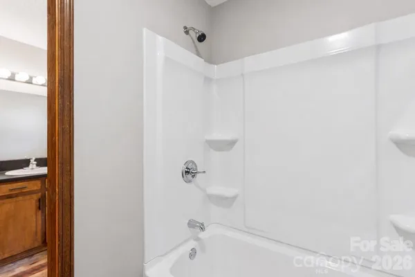 a bathroom with a bathtub