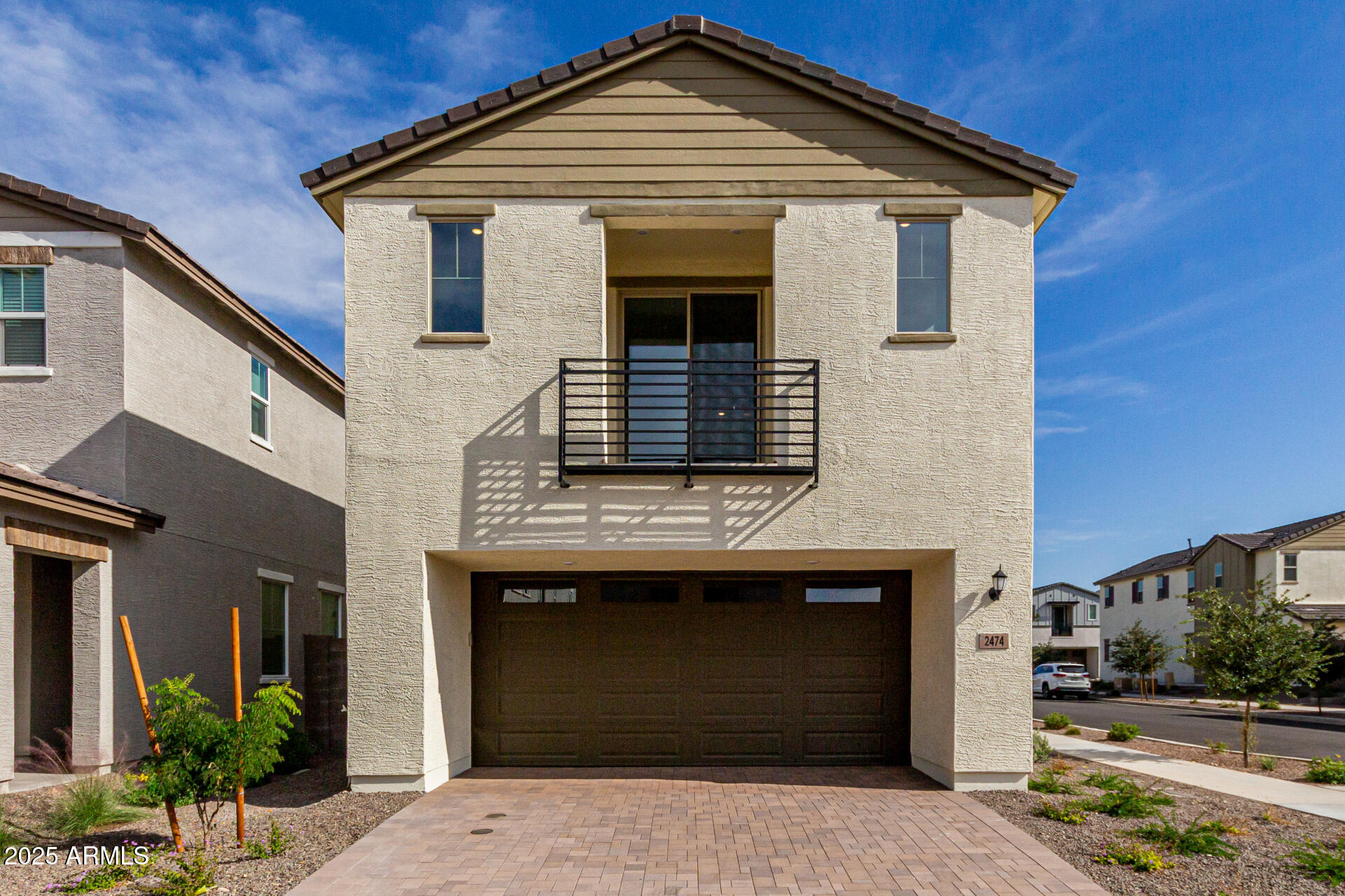 2474 West Rowel Road Phoenix, AZ 85085 - Photo 1 of 38 a front view of a house with a garage