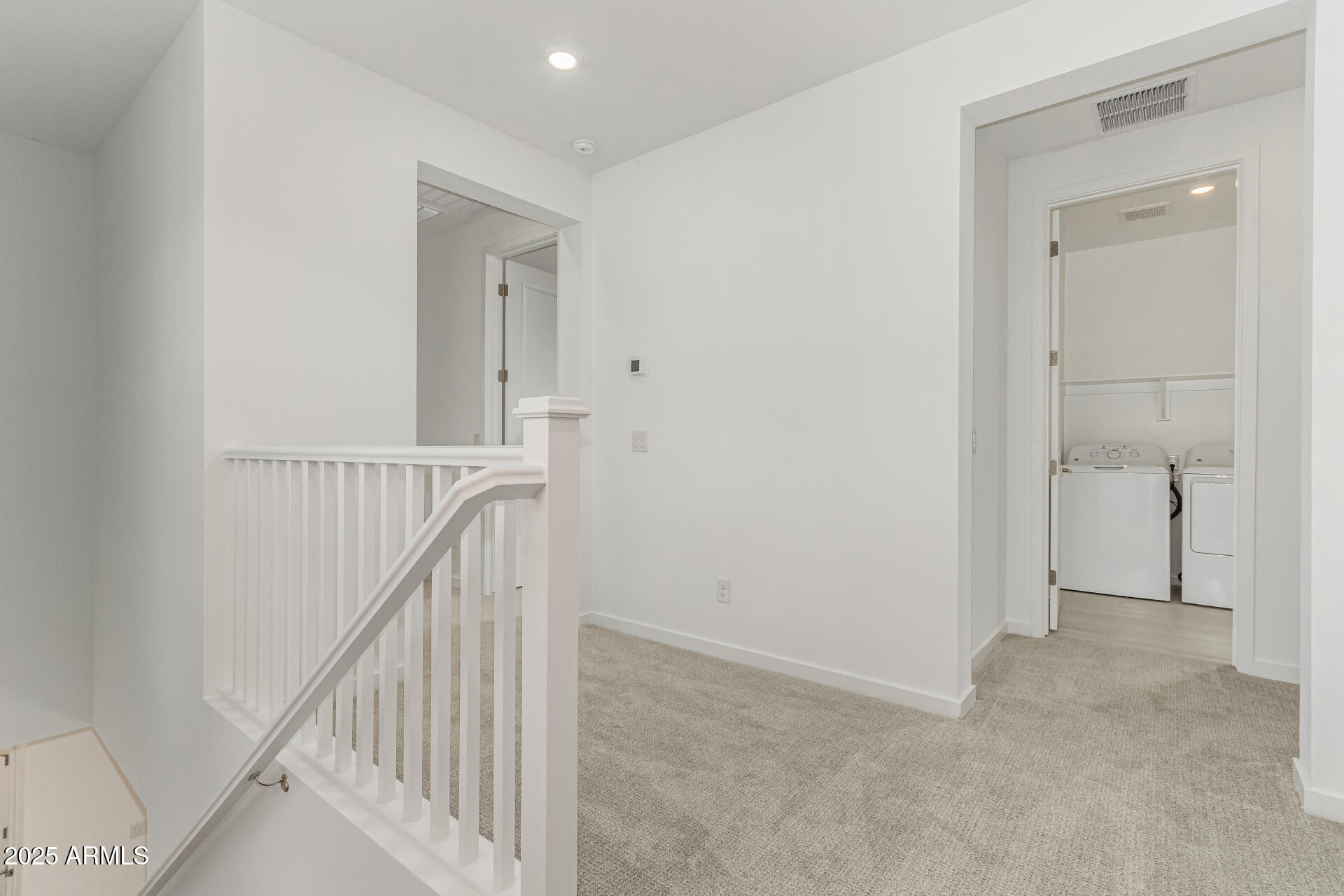 2474 West Rowel Road Phoenix, AZ 85085 - Photo 13 of 38 a view of a hallway with wooden floor and entryway