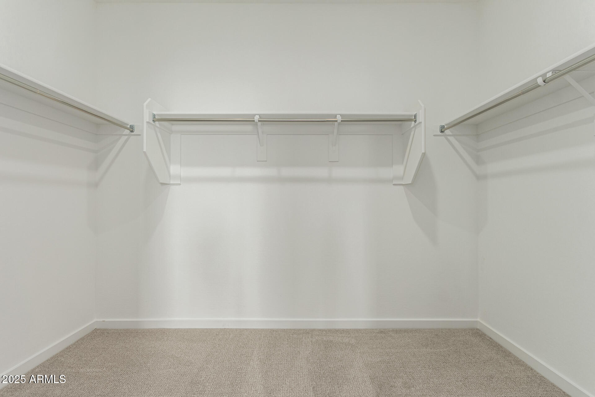 2474 West Rowel Road Phoenix, AZ 85085 - Photo 20 of 38 a view of an empty walk in closet