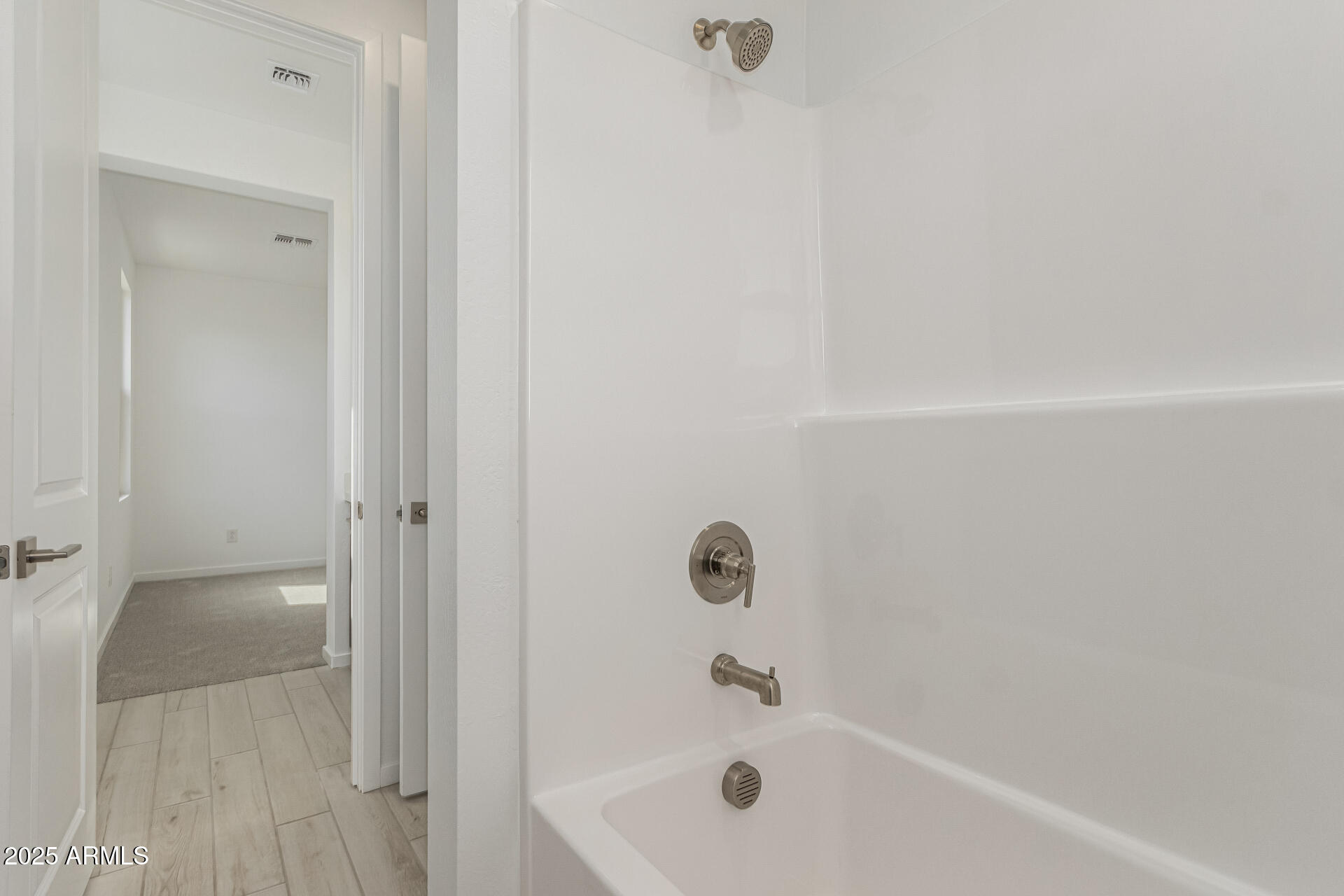 2474 West Rowel Road Phoenix, AZ 85085 - Photo 23 of 38 a bathroom with a tub
