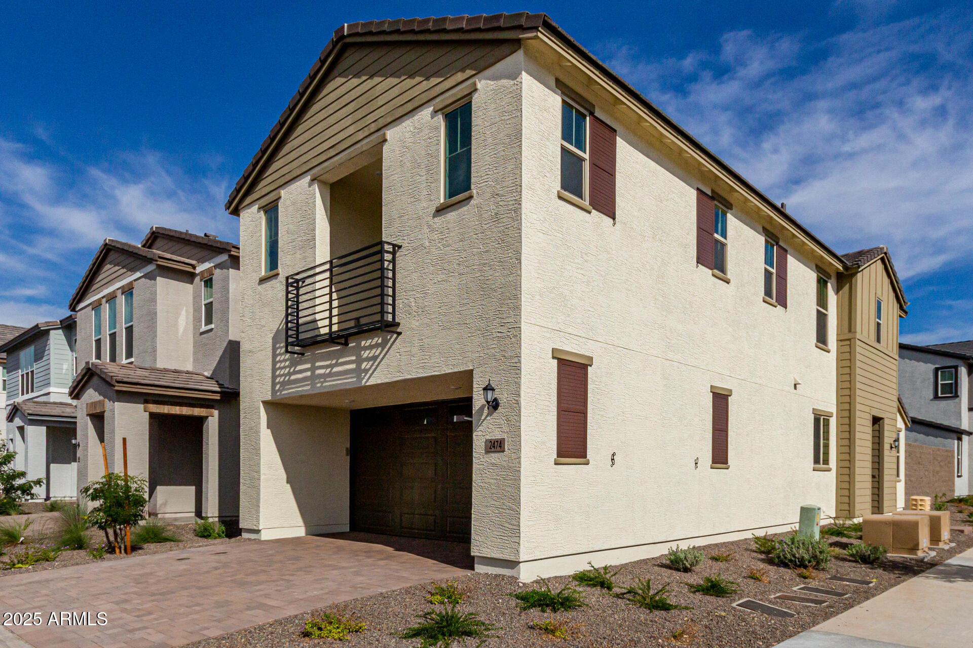 2474 West Rowel Road Phoenix, AZ 85085 - Photo 3 of 38 a front view of a house with a yard