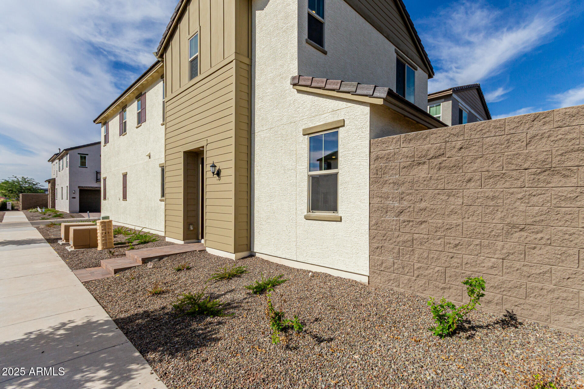 2474 West Rowel Road Phoenix, AZ 85085 - Photo 5 of 38 a view of a front of house with potted plants