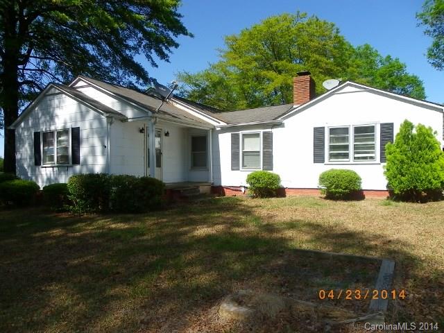1960 Pleasant Road Fort Mill, SC 29708 - Photo 1 of 9 a front view of a house with garden