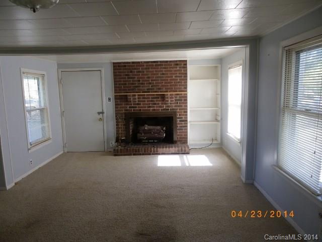 1960 Pleasant Road Fort Mill, SC 29708 - Photo 3 of 9 a view of empty room with a fireplace