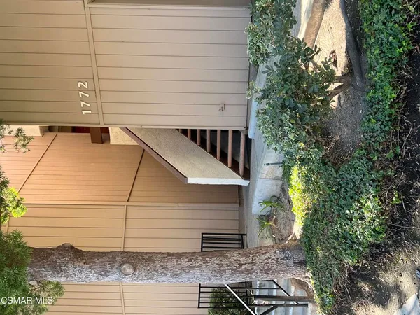 a house view with a backyard