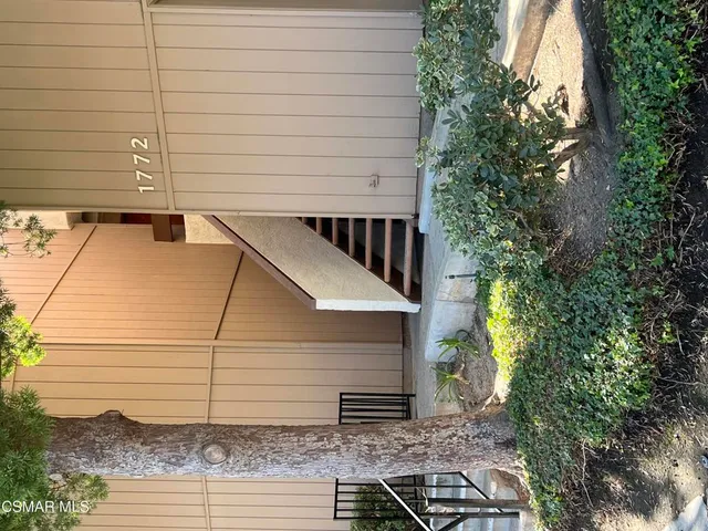 a house view with a backyard