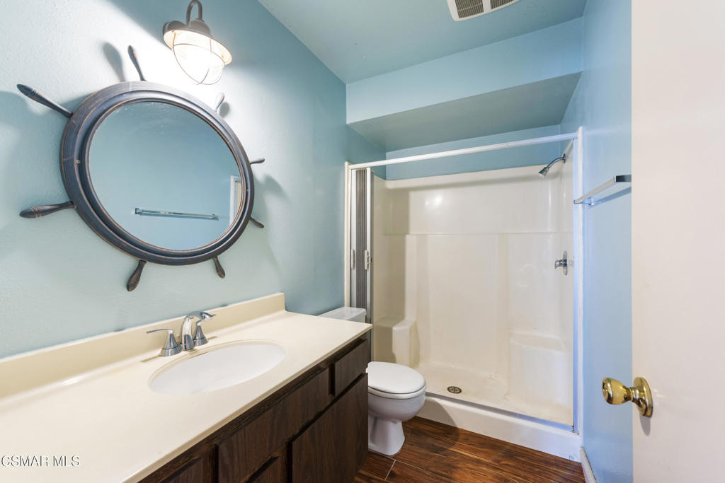 1772 Sinaloa Road, Unit 189 Simi Valley, CA 93065 - Photo 12 of 29 a bathroom with a sink and a mirror