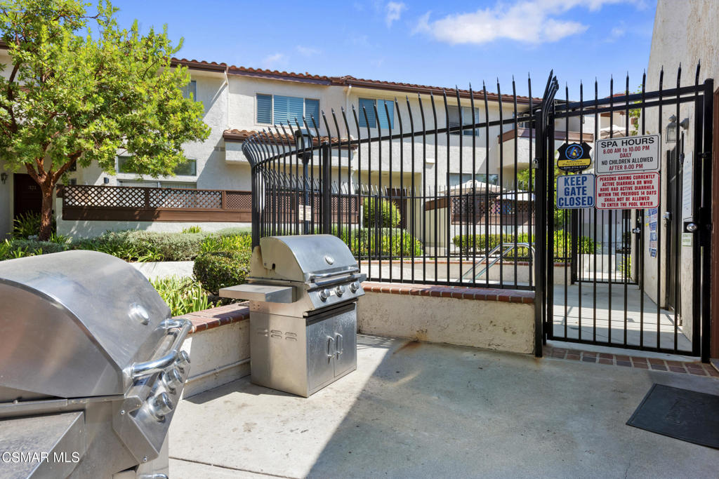 1772 Sinaloa Road, Unit 189 Simi Valley, CA 93065 - Photo 21 of 29 a view of a porch with furniture and a yard