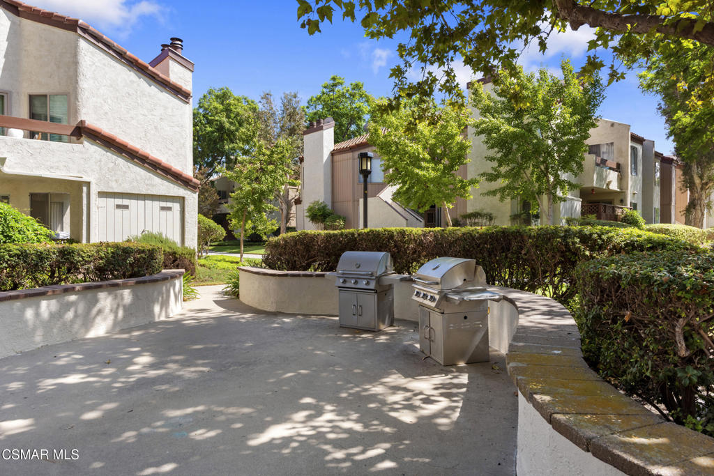 1772 Sinaloa Road, Unit 189 Simi Valley, CA 93065 - Photo 24 of 29 a view of a backyard with sitting area