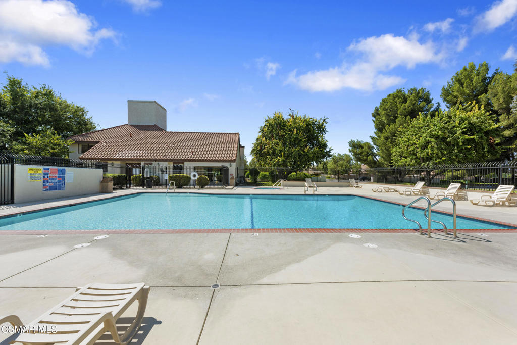 1772 Sinaloa Road, Unit 189 Simi Valley, CA 93065 - Photo 26 of 29 a view of a tennis ground with large trees