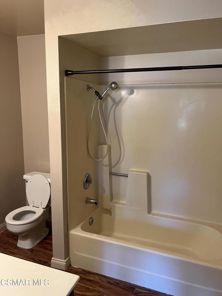 1772 Sinaloa Road, Unit 189 Simi Valley, CA 93065 - Photo 5 of 29 a bathroom with a sink a toilet and a bathtub
