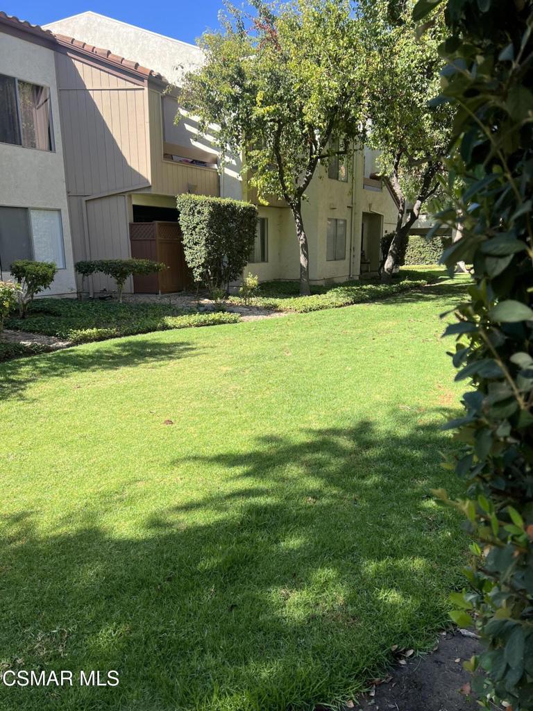1772 Sinaloa Road, Unit 189 Simi Valley, CA 93065 - Photo 9 of 29 a view of a house with a yard