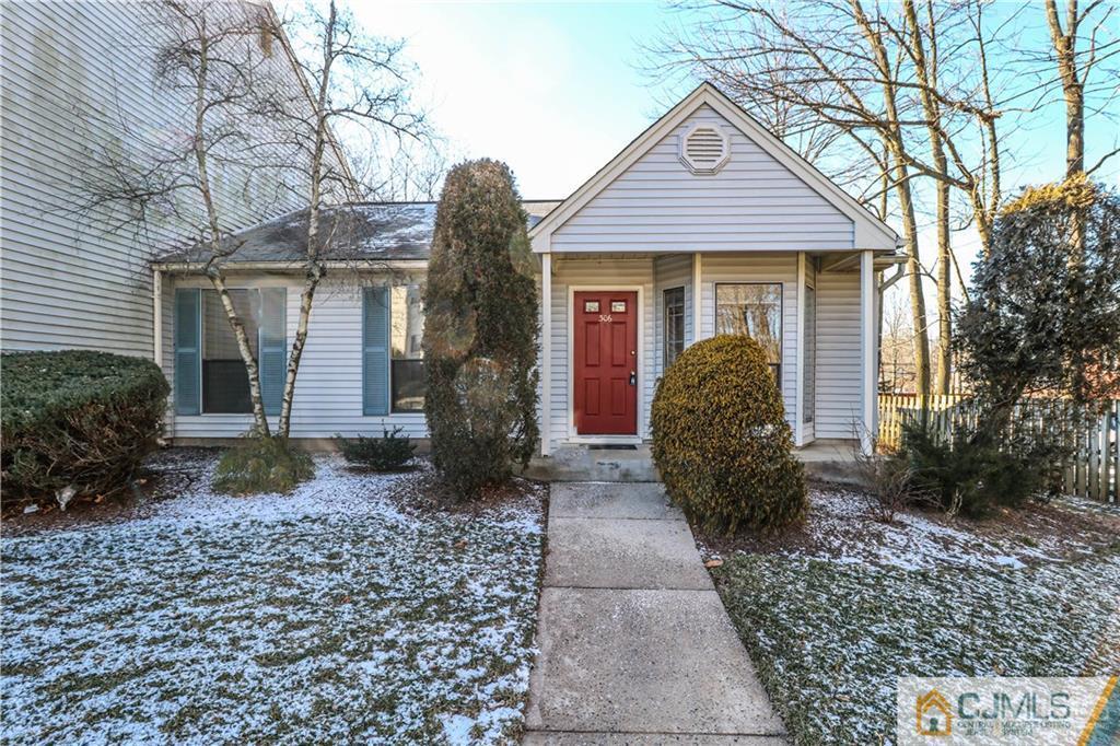 306 Maplecrest Road, Unit 306 Edison, NJ 08820 - Photo 1 of 25 a front view of a house with garden