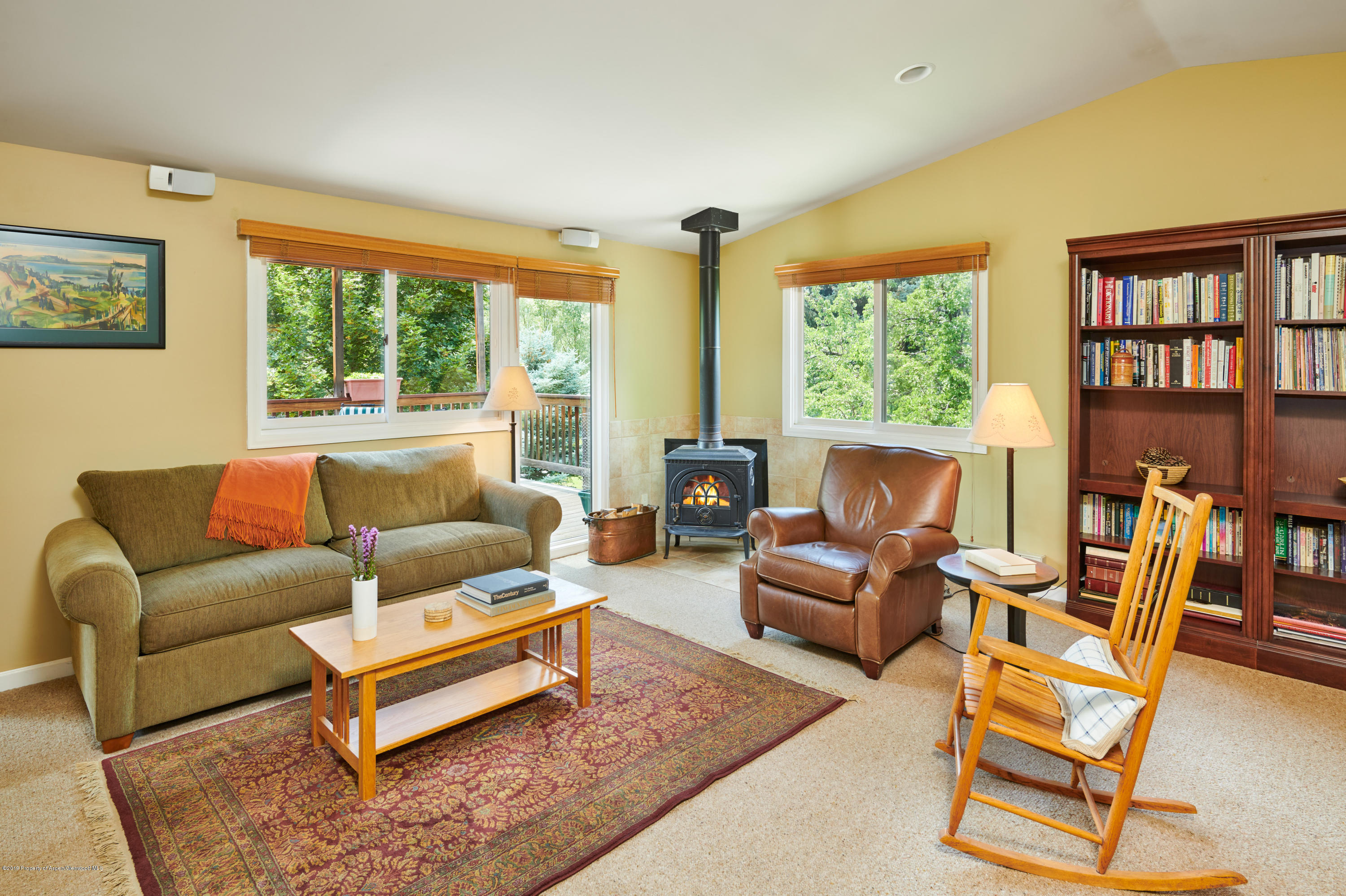 269 Holland Hills Road Basalt, CO 81621 - Photo 3 of 23 a living room with furniture and a large window