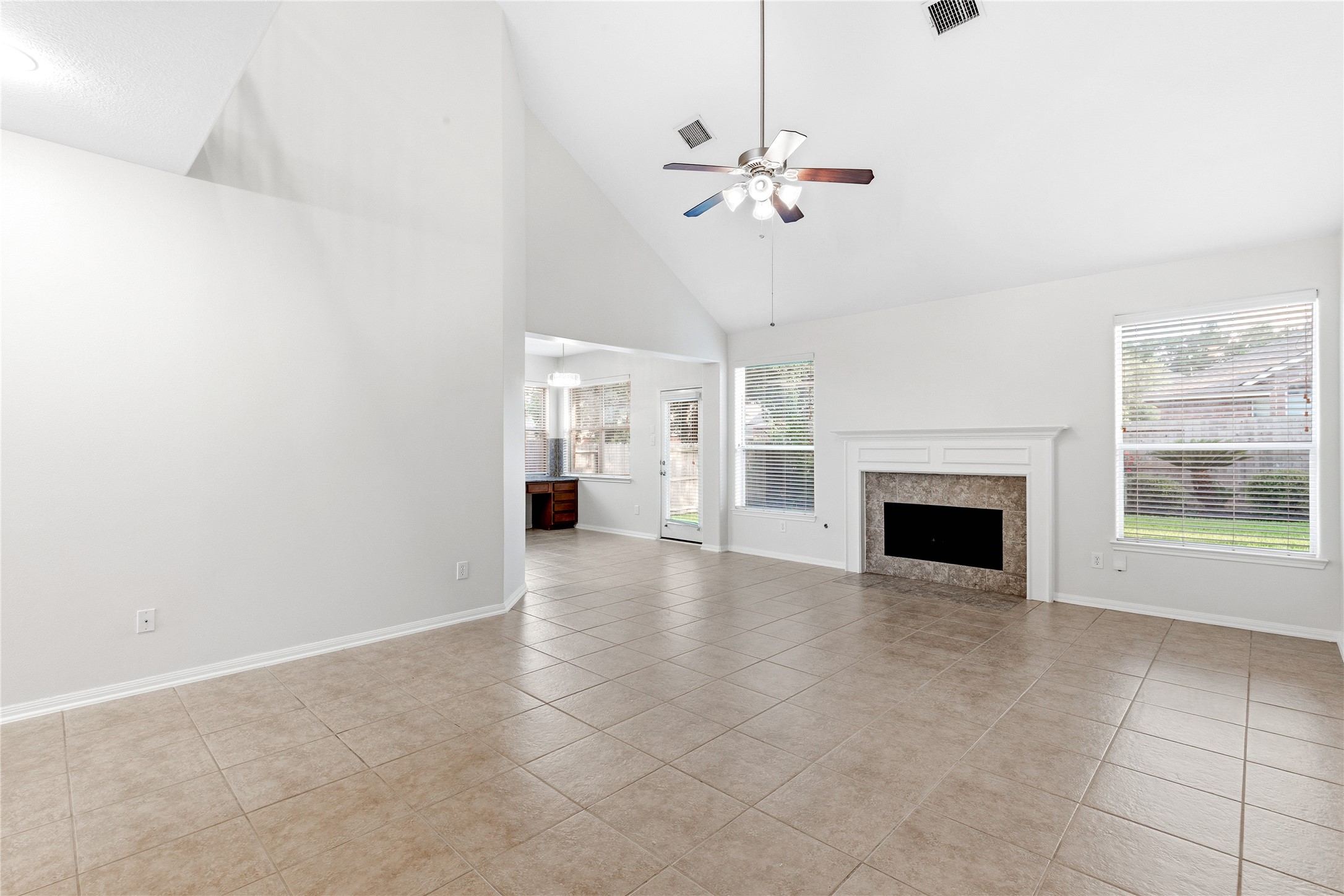 6211 Stone Hill Road Spring, TX 77389 - Photo 9 of 43 a view of an empty room with a fireplace