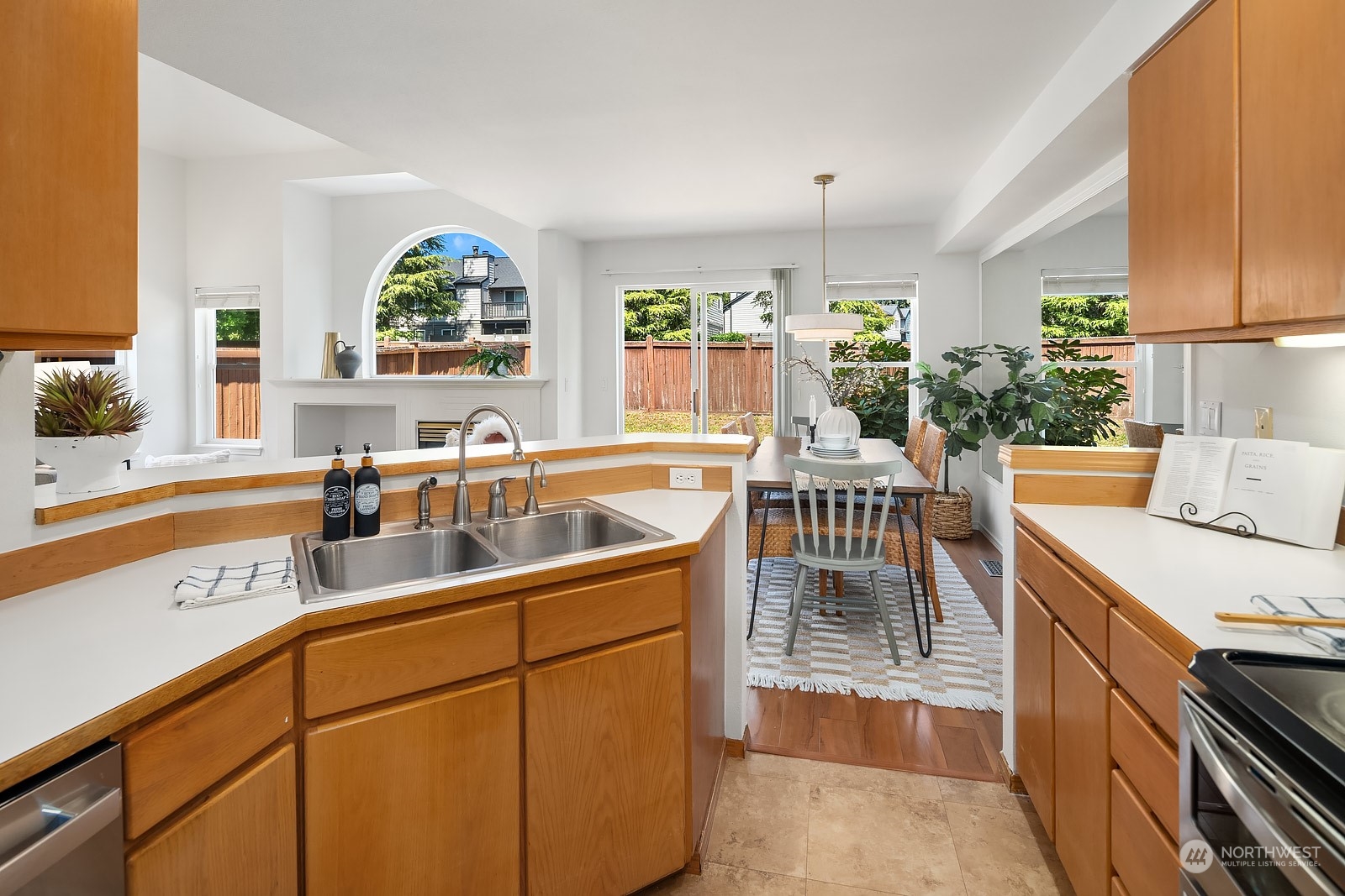 1925 187th Place Southeast Bothell, WA 98012 - Photo 15 of 30 a kitchen with stove a sink and a refrigerator