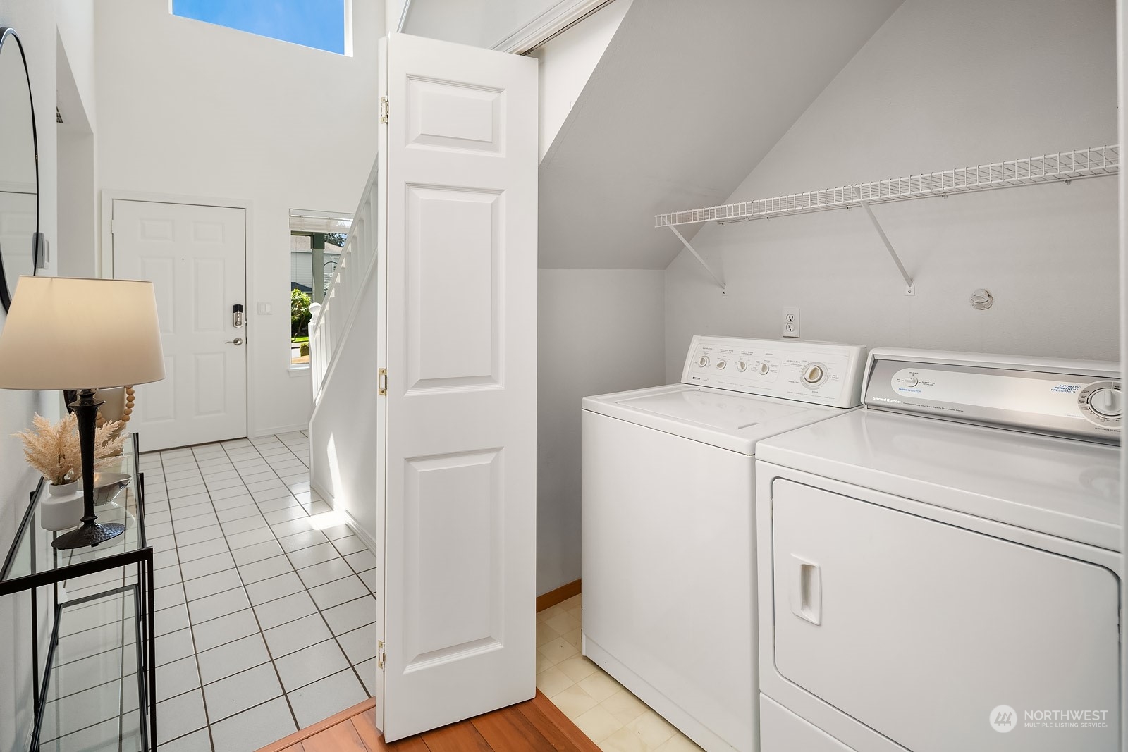 1925 187th Place Southeast Bothell, WA 98012 - Photo 17 of 30 a utility room with cabinets washer and dryer