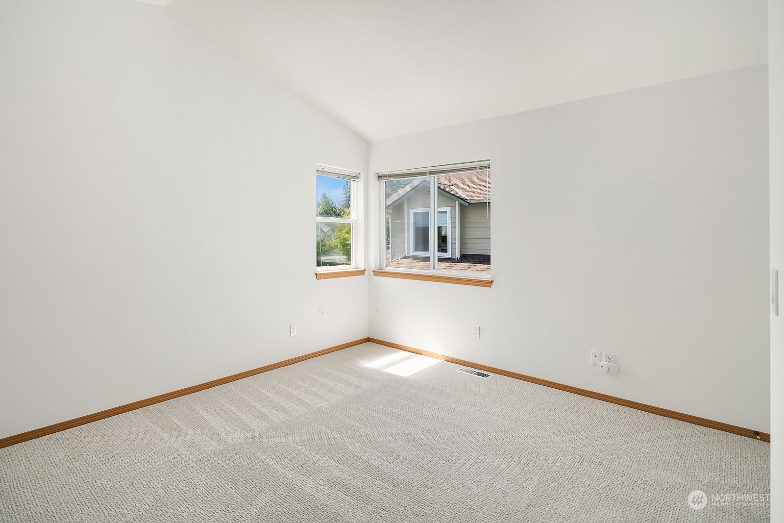 1925 187th Place Southeast Bothell, WA 98012 - Photo 22 of 30 an empty room with windows