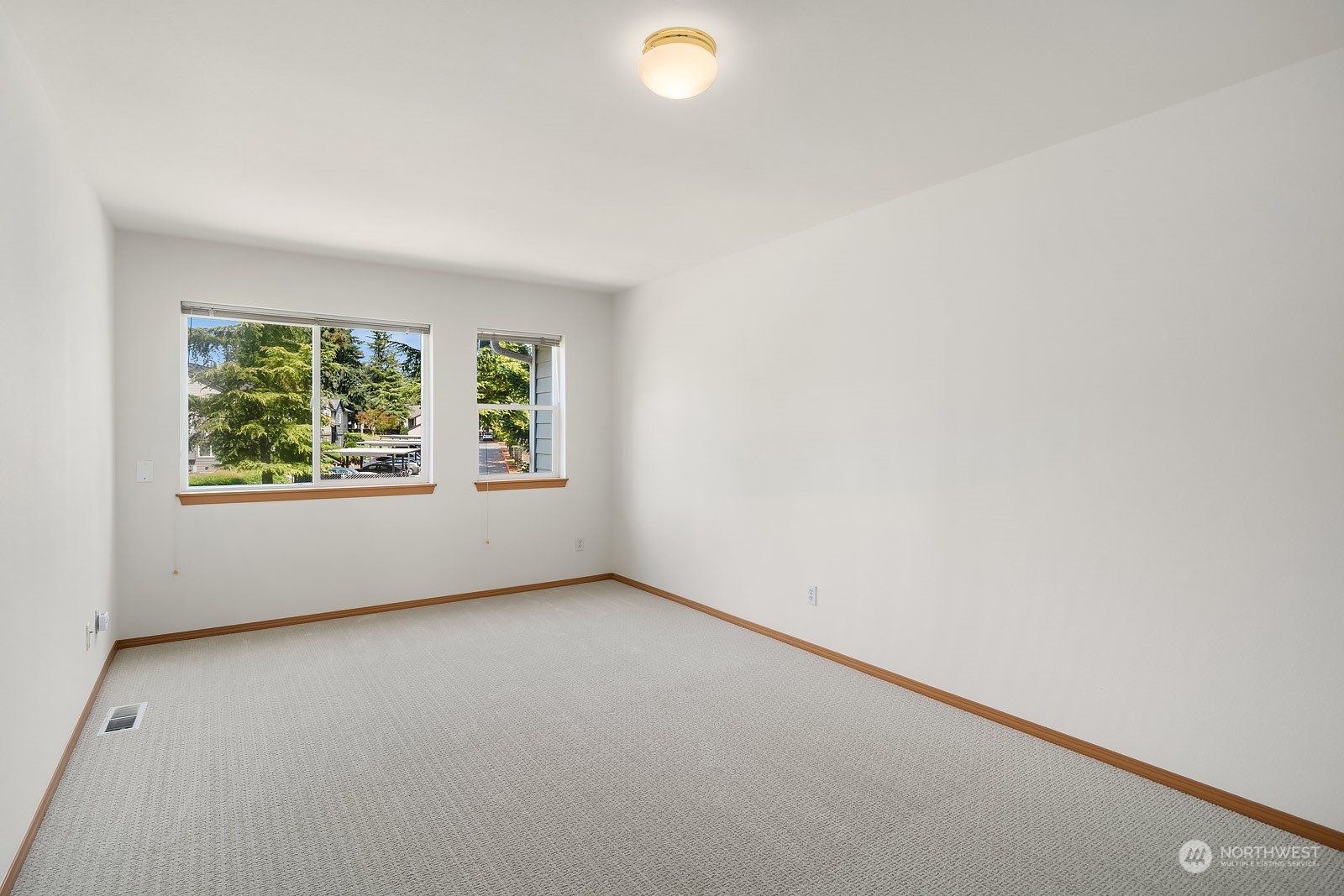 1925 187th Place Southeast Bothell, WA 98012 - Photo 25 of 30 an empty room with windows