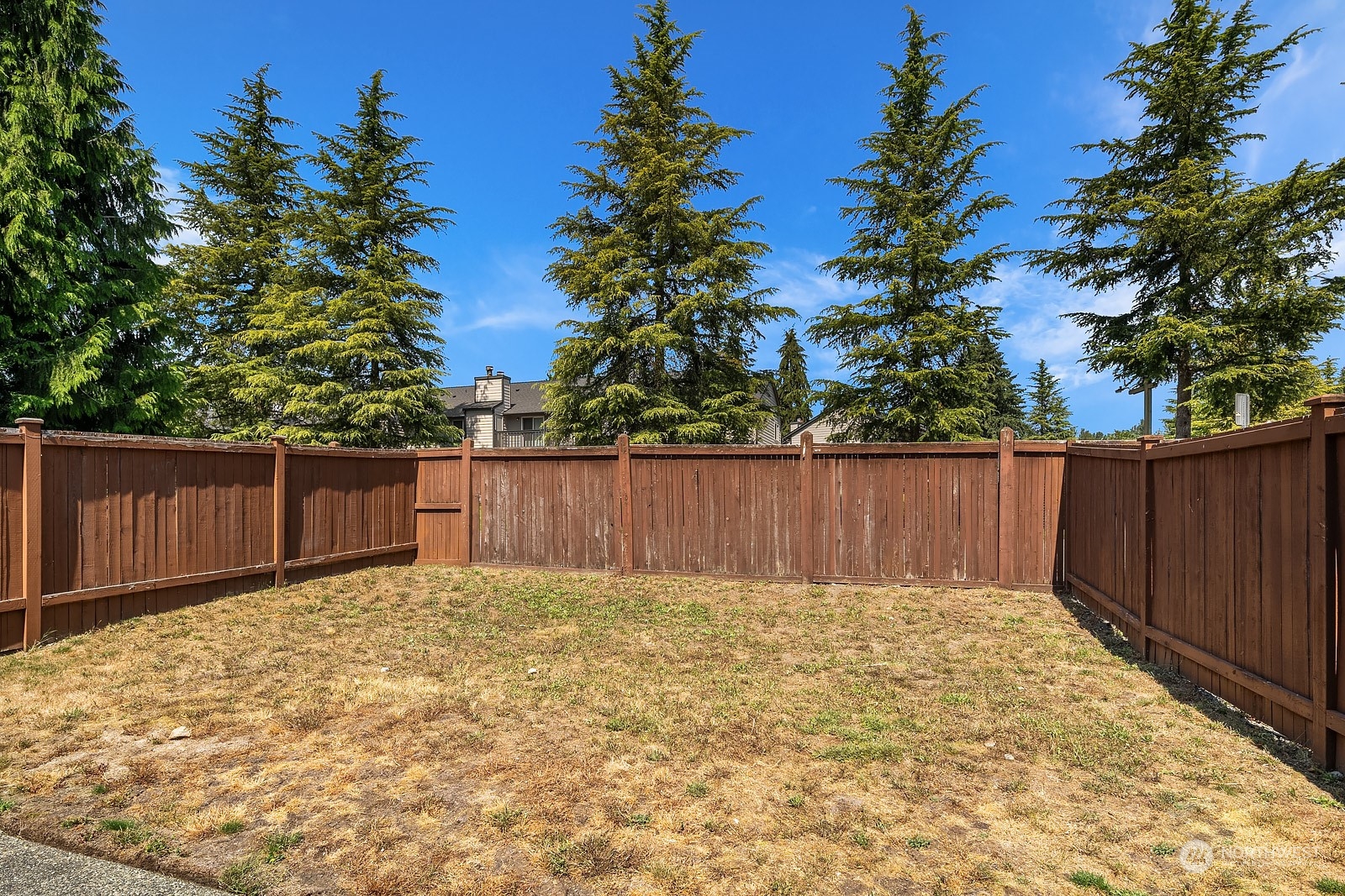 1925 187th Place Southeast Bothell, WA 98012 - Photo 26 of 30 a view of backyard with wooden fence