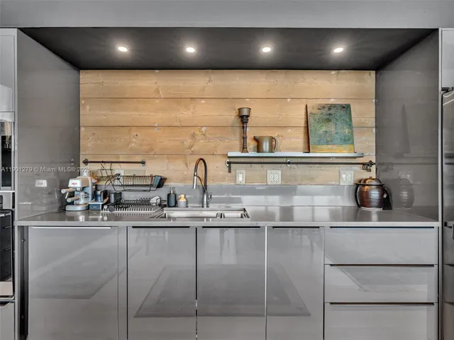 a view of a living room and floor to ceiling window