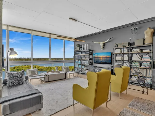 a living room with furniture and window