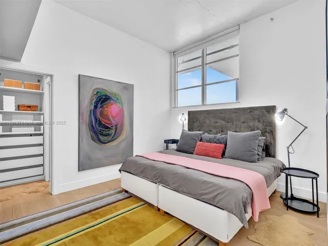 a picture of a book and a bed