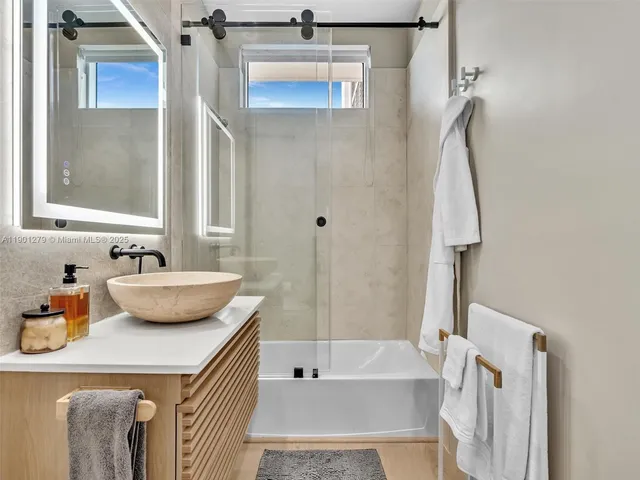 a living room with a bed