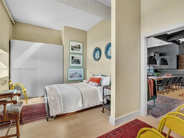 a view of terrace with lawn chairs