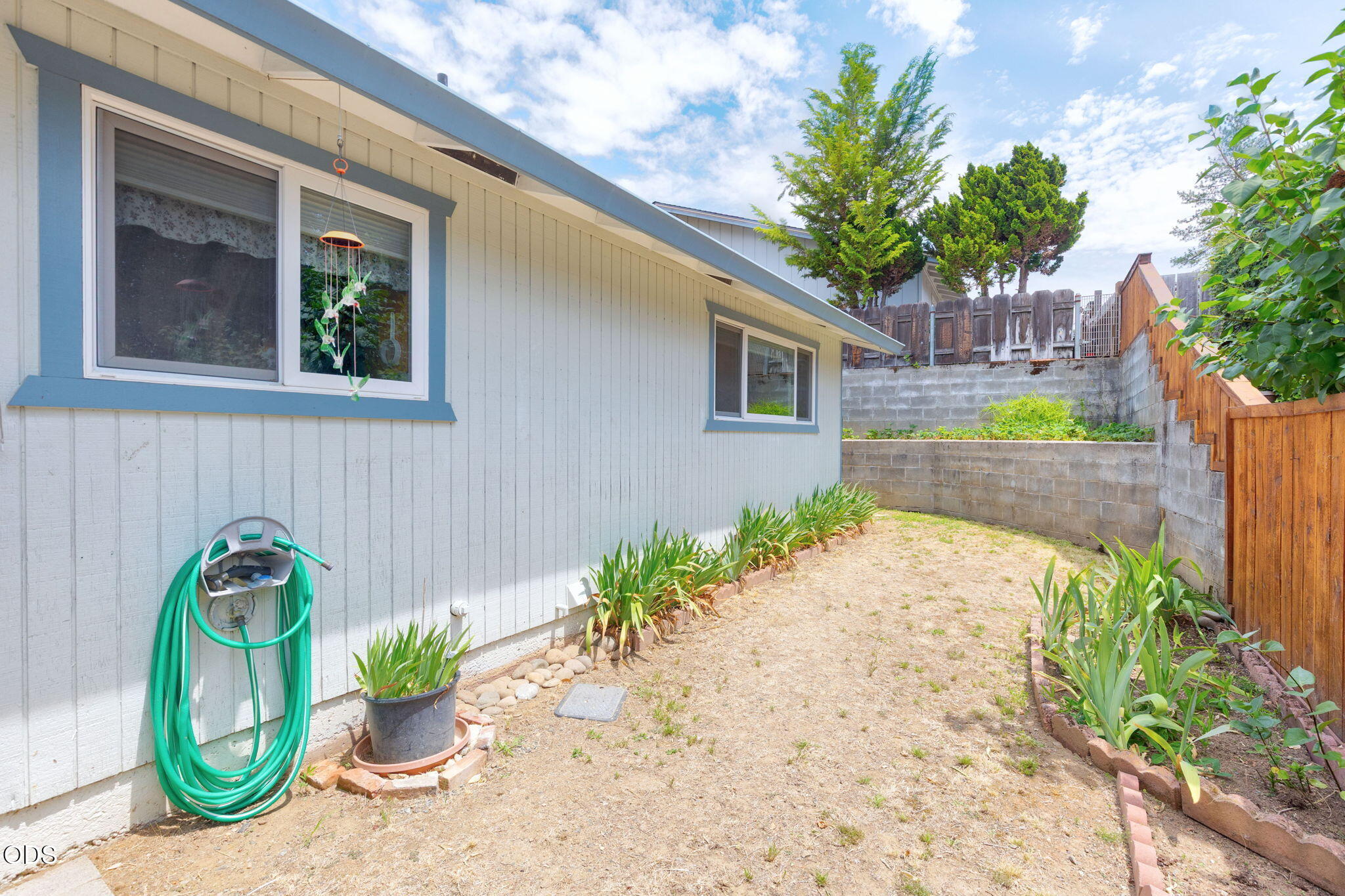 103 Brookside Court Rogue River, OR 97537 - Photo 18 of 27 a front view of a house with garden